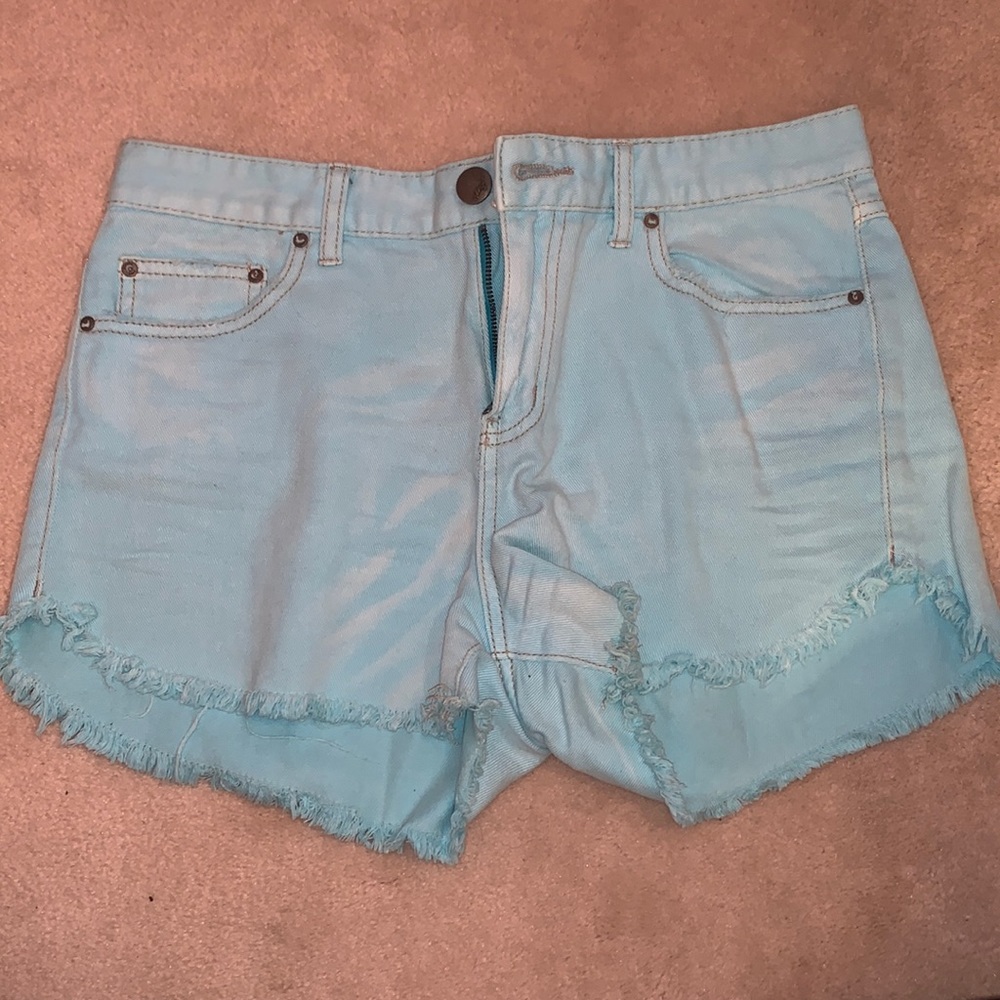 Free People high waisted distressed blue fray Jean shorts